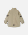 Giacca di mezza stagione ReimaTec di Reima Symppi per bambini, colore Earthy Beige – Packshot, vista laterale 3