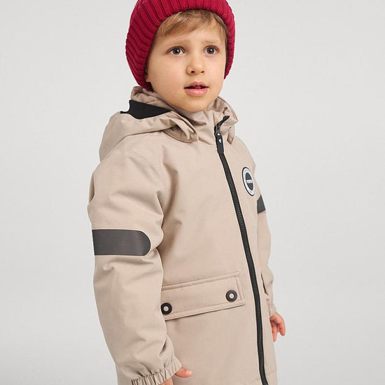 Giacca di mezza stagione ReimaTec di Reima Symppi per bambini, colore Earthy Beige – Foto in studio
