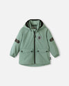 Giacca di mezza stagione ReimaTec di Reima Symppi per bambini, colore Stone Green – Foto del prodotto (vista frontale)
