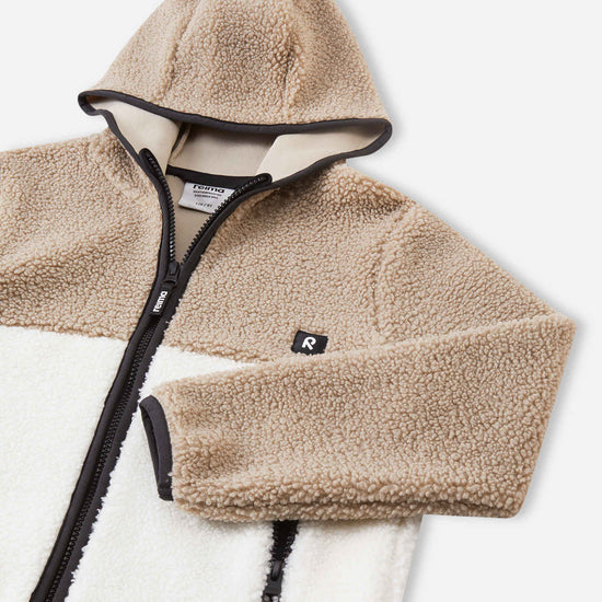 Chaqueta de forro polar Teddy Reima Muhkea para niños, color Earthy Beige – Detalles del producto