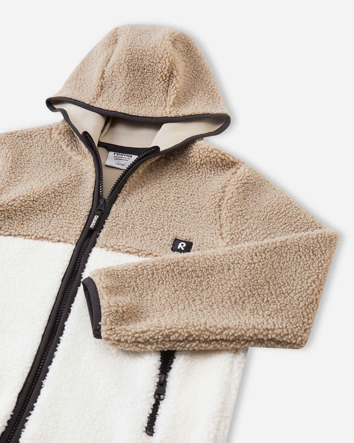 Chaqueta de forro polar Teddy Reima Muhkea para niños, color Earthy Beige – Detalles del producto