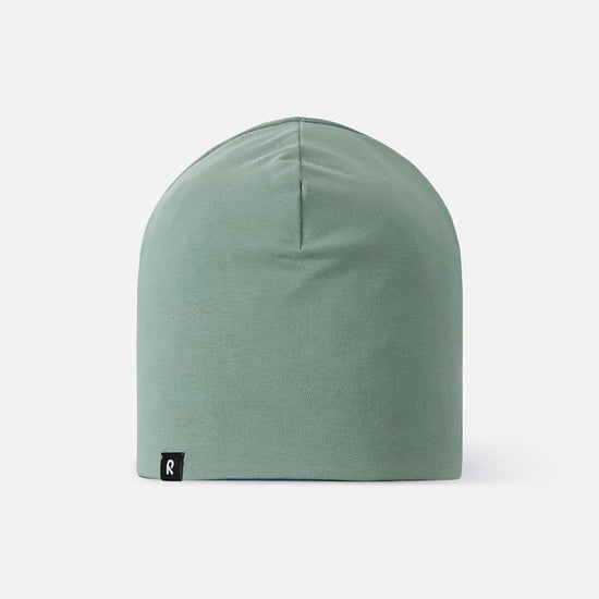 Gorro reversible Reima Tanssi para niños – Stone Green – Foto de producto: lado reversible