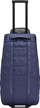 Db HUGGER ROLLER BAG CHECK - IN 60L - PeakStyle