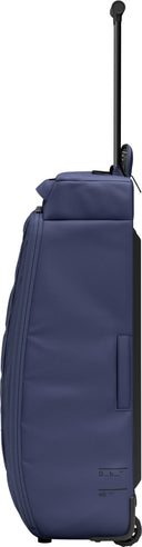 Db HUGGER ROLLER BAG CHECK - IN 60L - PeakStyle