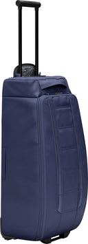 Db HUGGER ROLLER BAG CHECK - IN 60L - PeakStyle