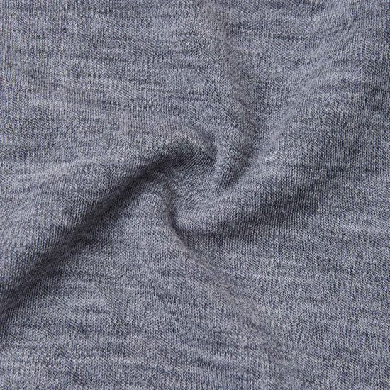 Moufles Reima Eino en laine mérinos pour enfants, gris chiné – Gros plan sur la matière