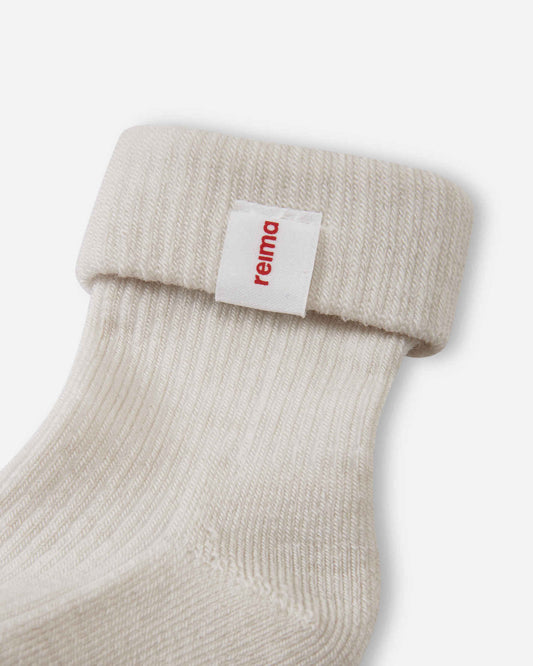 Chaussettes Reima Mussukka en laine mérinos pour bébé, lot de 2, couleur Birch Beige – Packshot 2